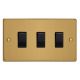 XDE73B.BB [XDEPGY3.BB + 3x G103SB] Varilight 3 Gang Comprising of 3 Intermediate (3 Way) 10 Amp Switch Essential Brushed Brass Finish With Black Switches, On a Double Plate